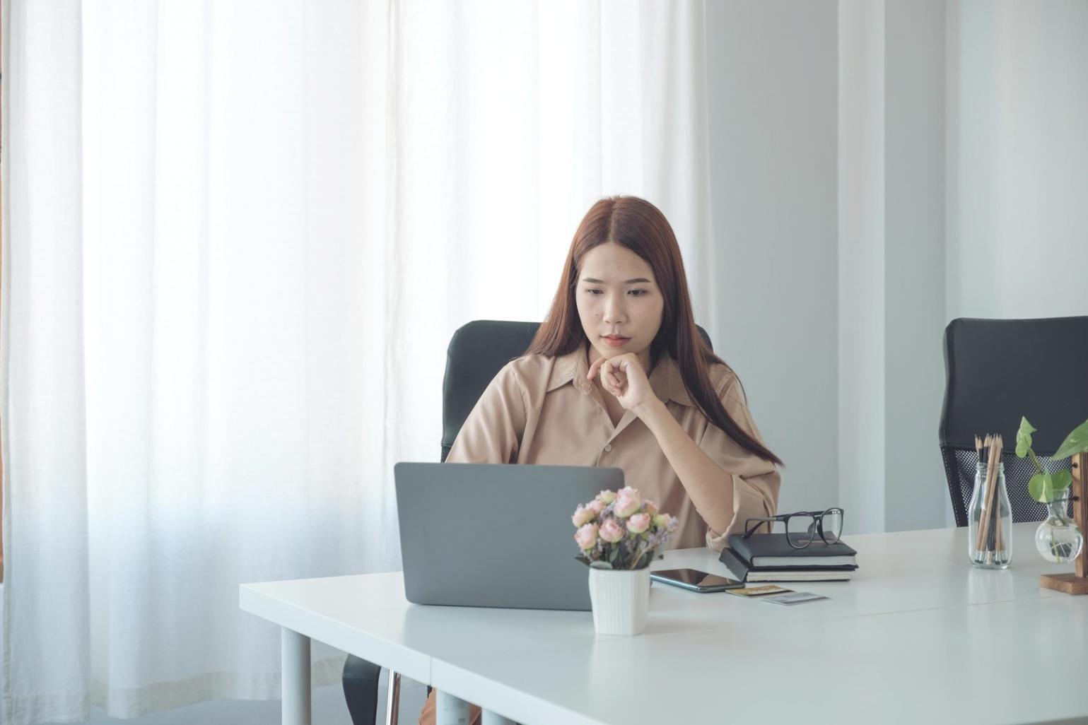 Financial planning workspace with documents and calculator